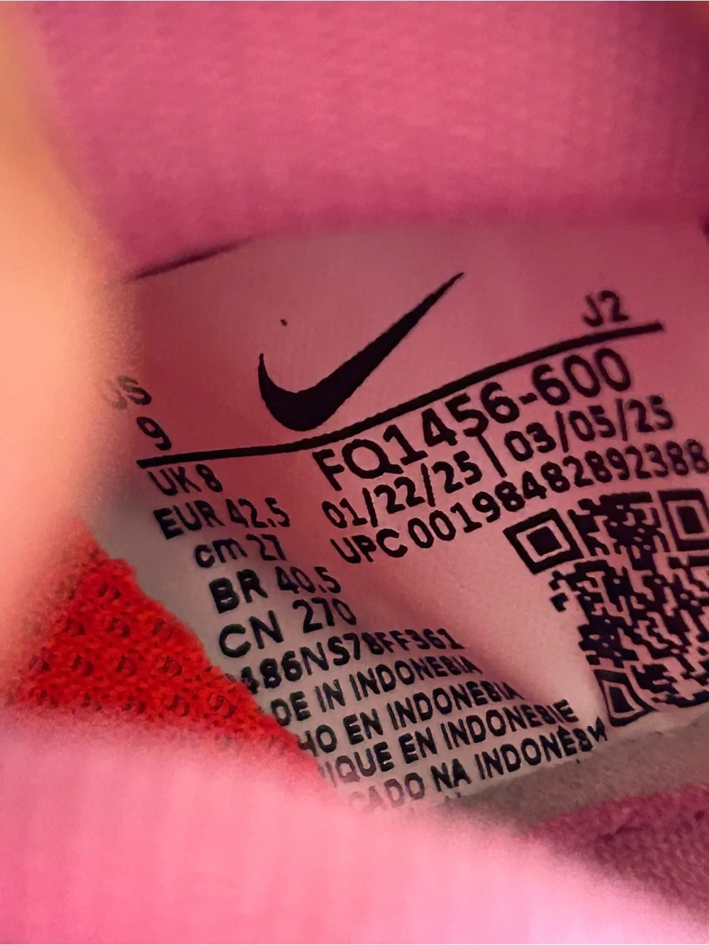 Nike Women’s Pink Sneakers with Orange Swoosh